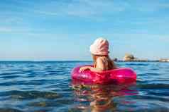 女孩孩子粉红色的巴拿马游泳海圆