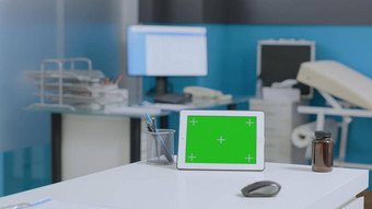 模拟绿色屏幕平板电脑电脑孤立的显示站表格空医院办公室