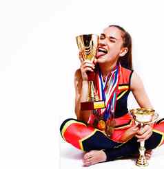 年轻的微笑啦啦队长女孩金杯价格奖牌孤立的白色背景生活方式体育运动人概念