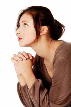 年轻的女人祈祷