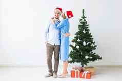 假期庆祝活动概念年轻的夫妇庆祝圣诞节首页