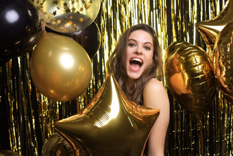 快乐女人节日装持有黄金气球