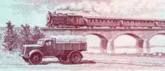 卡车蒸汽乘客火车穿越高架桥