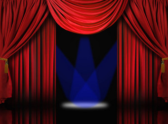 天鹅绒剧院阶段褶皱窗帘蓝色的聚光灯