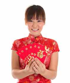 中国人旗袍女孩持有红色的包