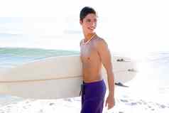 冲浪者男孩少年冲浪板海滩