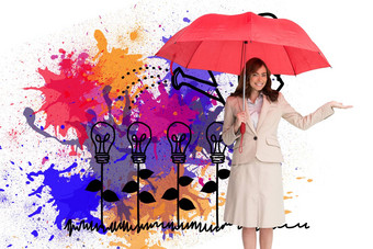 复合图像快乐女商人持有伞