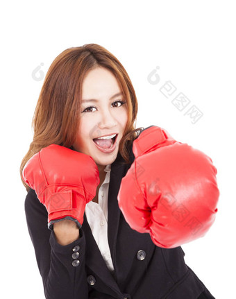 年轻的有吸引力的业务女人拳击手套