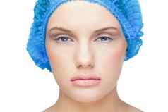 内容漂亮的模型穿蓝色的外科手术帽