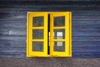 纹理明亮的画木墙黄色的关闭窗口