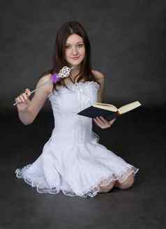 女孩仙女白色衣服魔法魔杖书