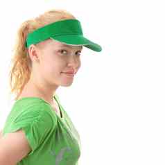 年轻的美丽的金发碧眼的女人绿色帽