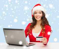圣诞老人助手女人移动PC信贷卡