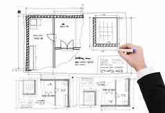 特写镜头商人手画蓝图