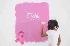 复合图像年轻的女人绘画墙粉红色的