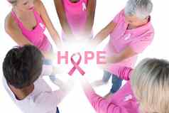 复合图像集团穿粉红色的丝带乳房癌症手