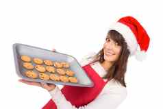 浅黑肤色的女人圣诞老人他提供热饼干