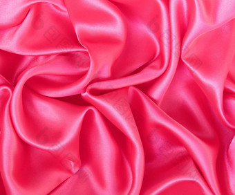 光滑的粉红色的丝绸背景