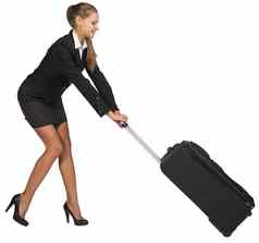 女商人拖重有轮子的手提箱最大限度应变