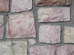 粉红色的石头墙背景