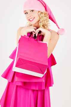 快乐的圣诞老人助手女孩购物袋