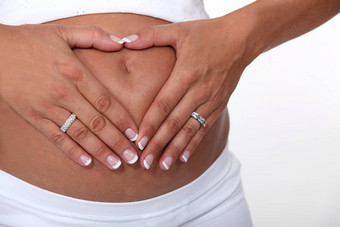 女人触碰怀孕了肚子