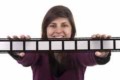 年轻的女人持有电影照片框架孤立的白色使用