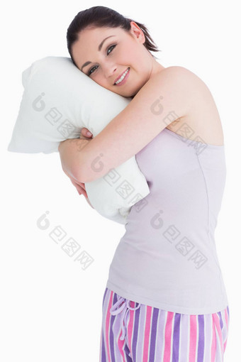 漂亮的站女人放松舒适的枕头