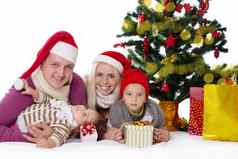快乐家庭孩子们圣诞老人帽子圣诞节三