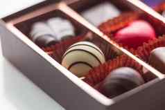 棕色（的）盒子巧克力各种各样的巧克力宏