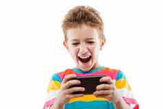 微笑孩子男孩玩游戏冲浪互联网智能电话