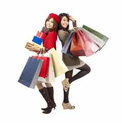 快乐亚洲时尚女孩持有购物袋礼物盒子