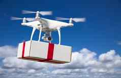 无人驾驶的飞机系统无人机四轴飞行器无人机交付盒子红色的丝带