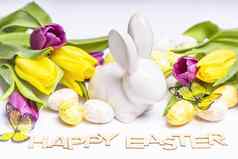 快乐复活节复活节白色兔子白色背景复活节鸡蛋新鲜的郁金香复活节问候卡复活节兔子复活节鸡蛋