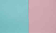 蓝色的粉红色的柔和的颜色纸几何平躺背景一边一边