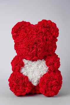 红色的泰迪熊foamirane玫瑰白色心泰迪爪子股票照片孤立的白色背景