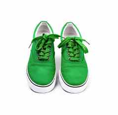 一对绿色帆布鞋子孤立的白色