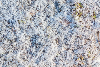 光雪开始冬天表面砾石路径象征未来冬天自然背景纹理