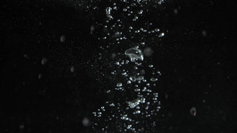 模糊的图片闪闪发光的水液体泡沫溅