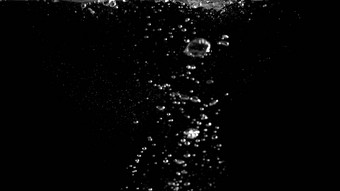 模糊的图片闪闪发光的水液体泡沫溅