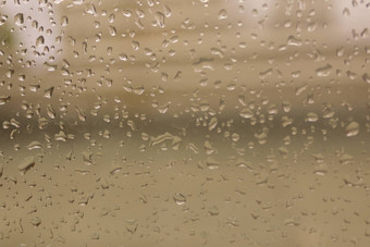 <strong>雨滴</strong>表面湿窗口玻璃放多雨的季节摘要背景自然模式<strong>雨滴</strong>孤立的户外多云的环境