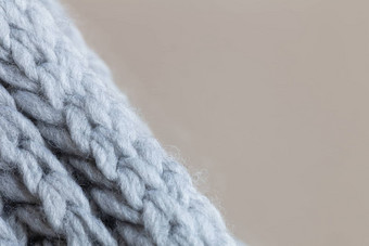 针织羊毛变形表面米色背景宏软灰色美利奴羊毛模式背景特写镜头秋天冬天平躺斯堪的那维亚最小的风格水平