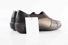 一对棕色（的）皮革鞋子白色背景孤立的产品前视图