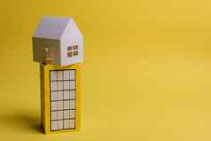 白色家庭纸房子块公寓黄色的背景纸简约简单的概念风格复制空间水平取向