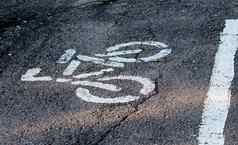 画自行车白色油漆自行车路径沥青