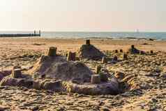 沙子城堡建筑海滩海洋背景夏天季节假期
