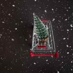 前视图杂货店车雪圣诞节树黑暗雪背景复制空间文本公寓说谎冬天明信片模板