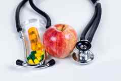 健康护理概念医学红色的苹果听诊器