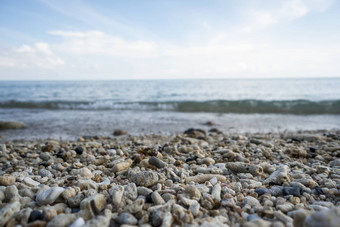 关闭圆形的抛光海滩岩石卵石石头海色彩斑斓的卵石石头