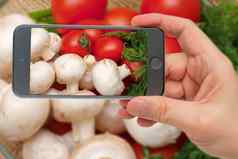 新鲜的蔬菜成分烹饪西红柿香榭丽舍智能手机屏幕